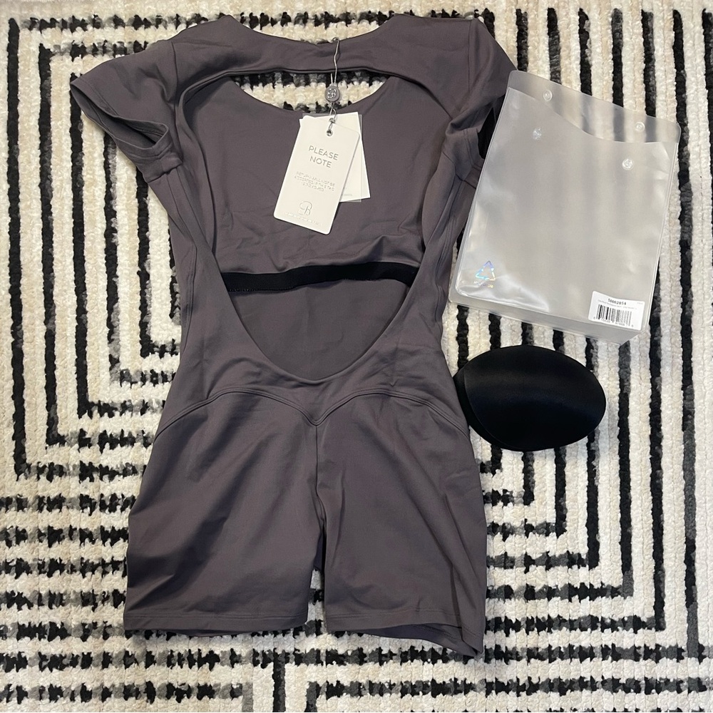 Bombshell Sportswear open back bodysuit short in grey smoke size LARGE NWT
